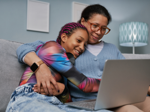 Mother and teen on computer