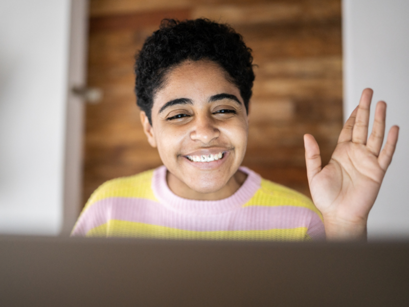 A teenager is in a virtual group therapy session after his caregiver learned why her teen should enroll in group therapy.