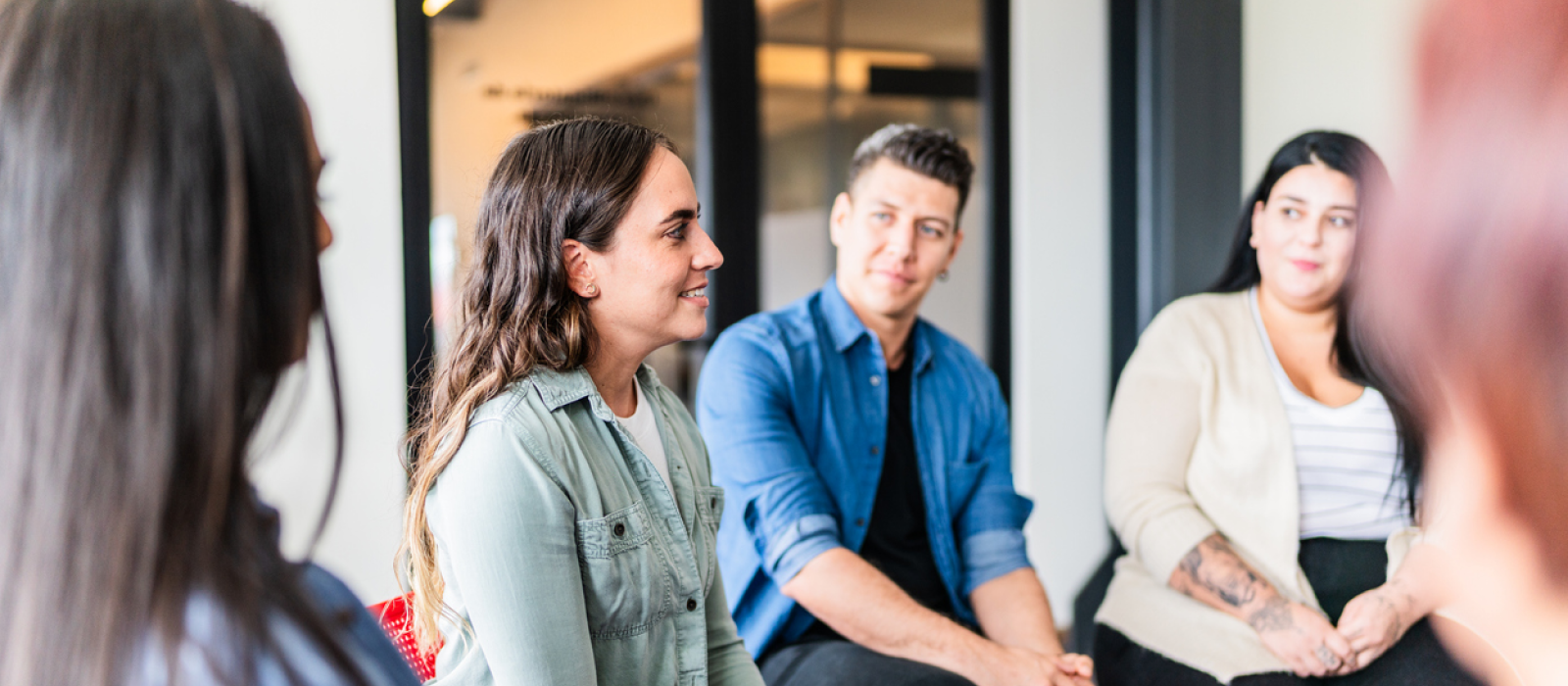 A young woman likes social support so she chose group therapy.