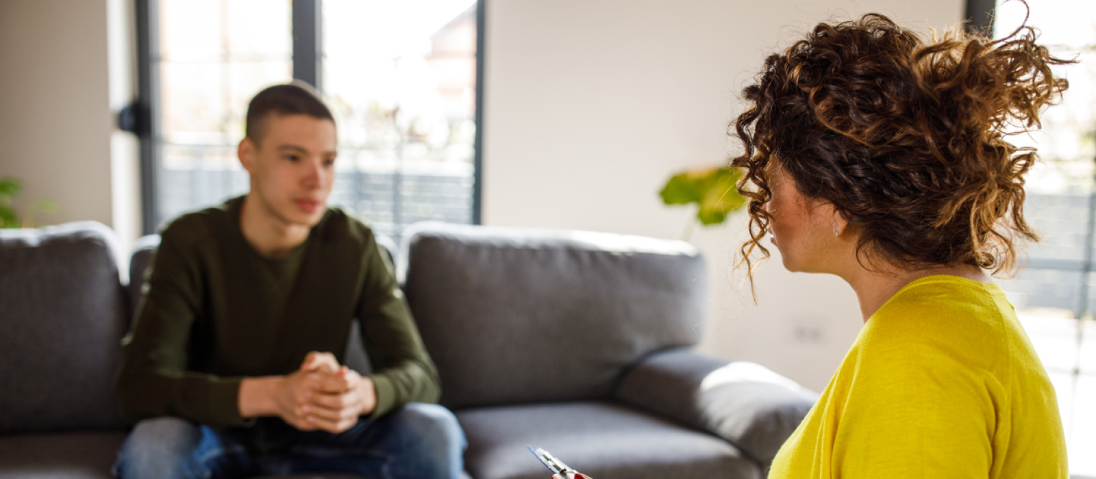 A young man is seeing a therapist; he is in the mental health continuum of care.