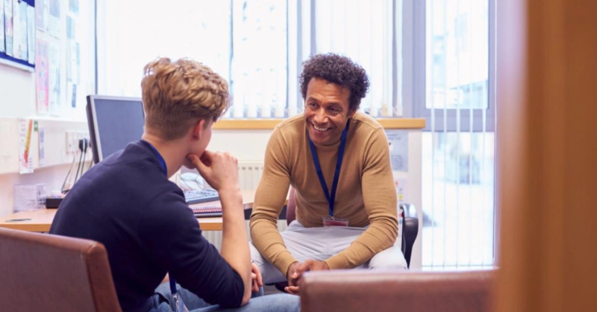 School counselor chatting with a student