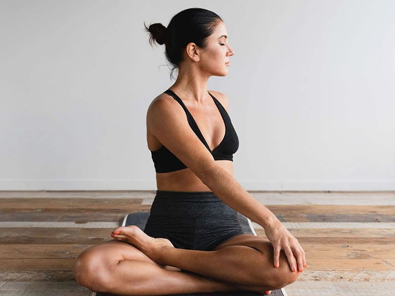 Woman practicing yoga