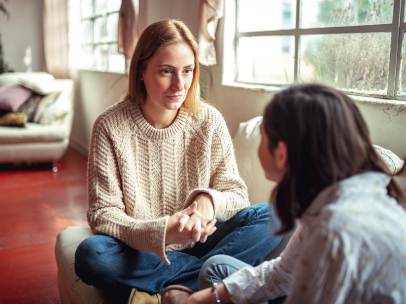 Teenage daughter talking to mom about her depression