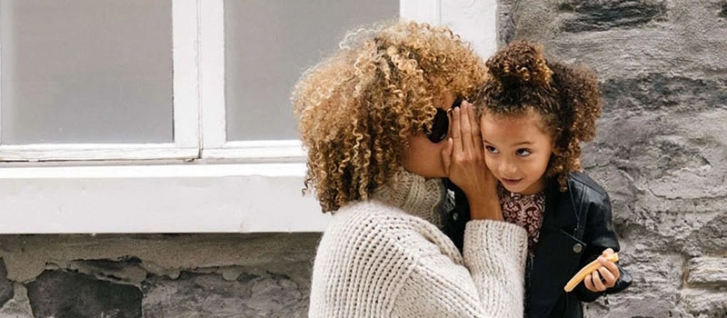 Mother talking to daughter