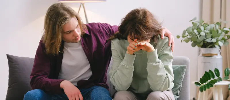 A friend consoles another friend after they trauma dumped