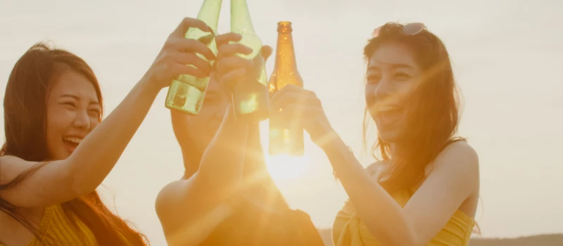 A group of teens drink alcohol