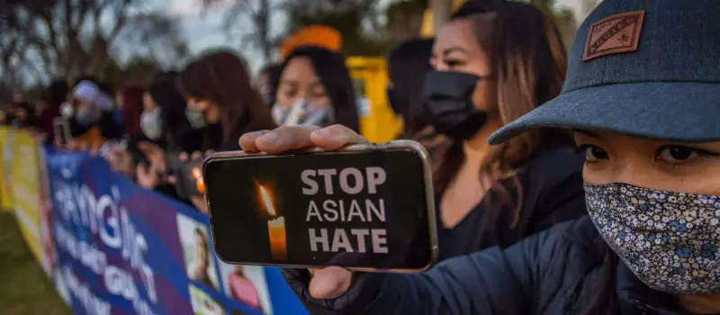 Group of Asian women marching against Asian hate