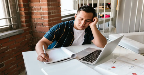 Young man struggling with sleep hygiene and mental health