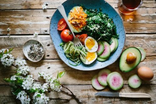 A table set with a healthy salad