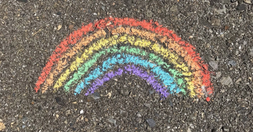 Pride rainbow drawn on pavement