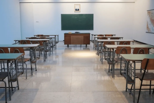 A classroom full of empty desks