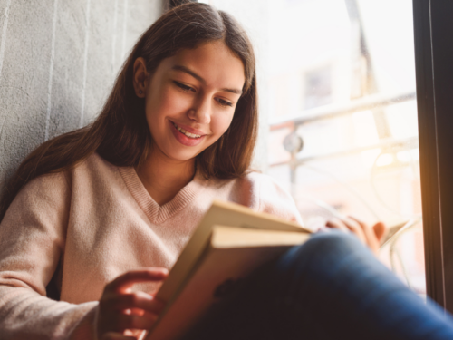 Teen reading while enjoying a self-care day