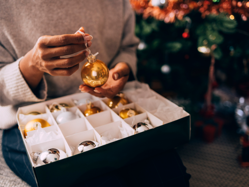 Women holding an ornament