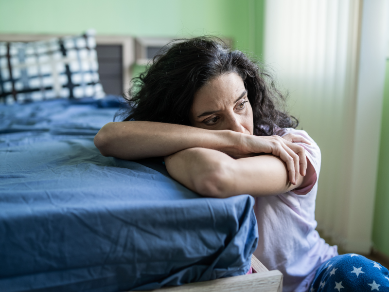 A woman looking off in the distance with conversion disorder