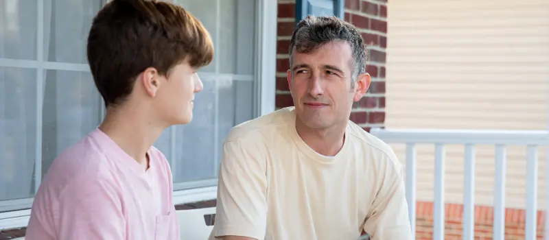 Father and son practicing using DEAR MAN