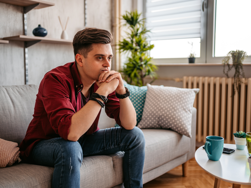 Person sitting and thinking to help cope with what is happening in their life