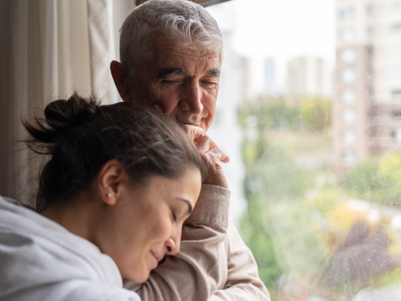 Lady talking to her dad about her past trauma