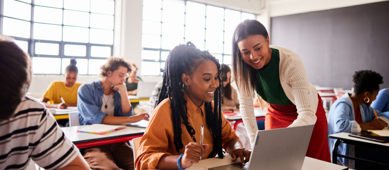 A student and her teacher work on a lesson in resilience 
