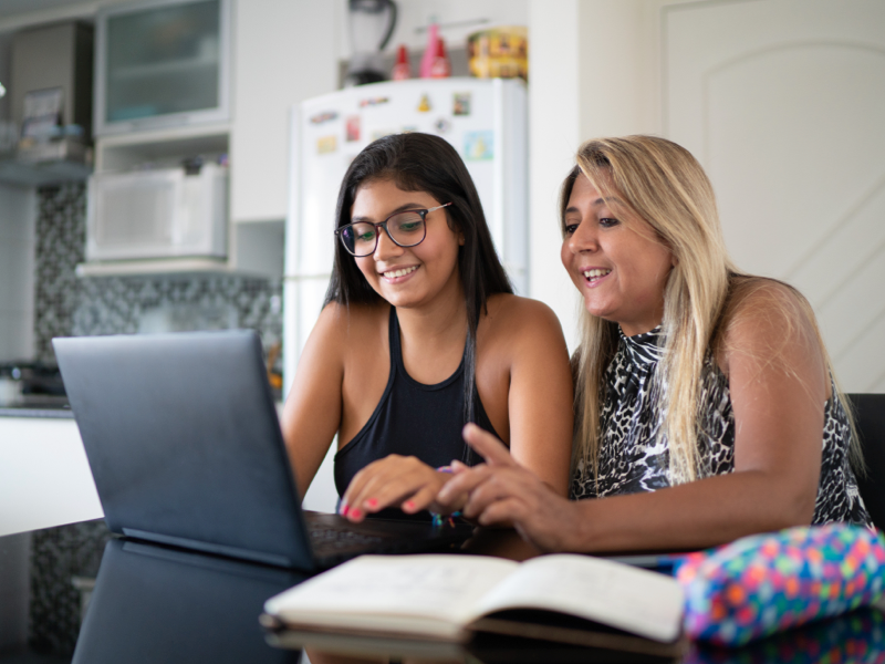 Woman and girl on laptop