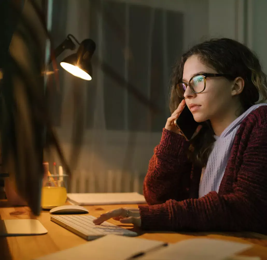 Girl in glasses on phone