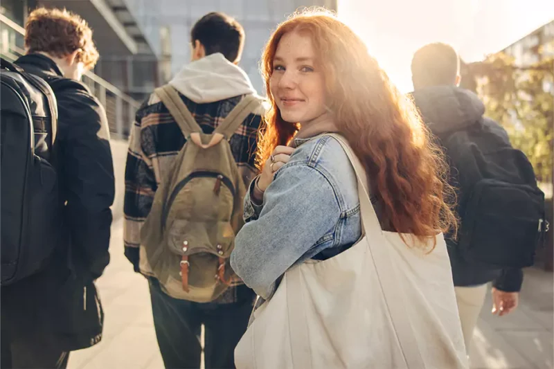 Teen girl with book bag