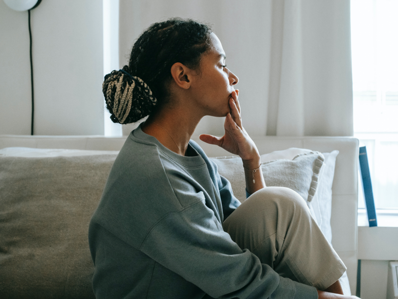 Woman with depression alone looking sad