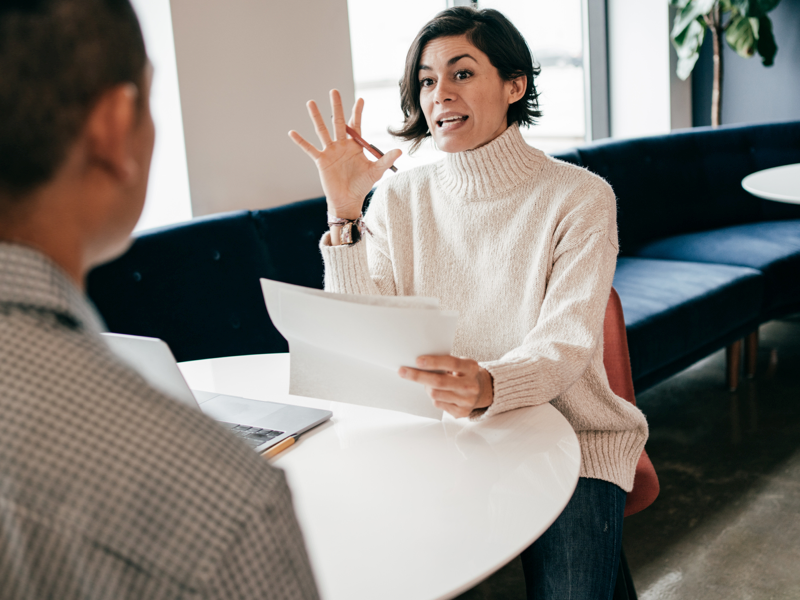  Therapist and man practicing motivational interviewing