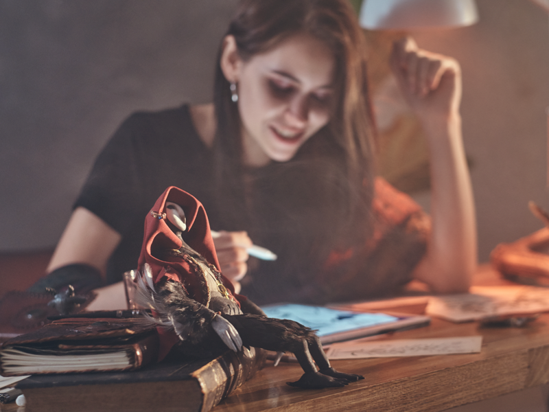 A young woman participates in drama therapy from home