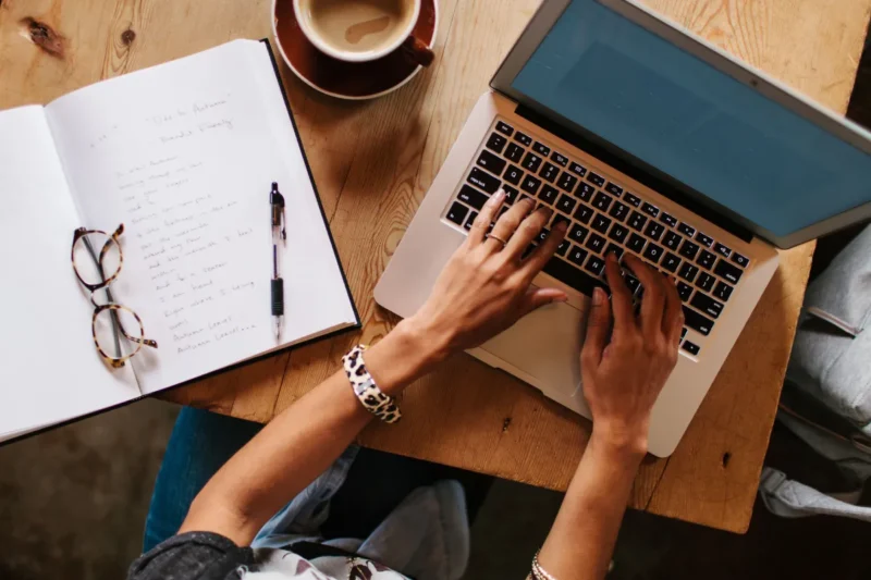 Woman typing on computer