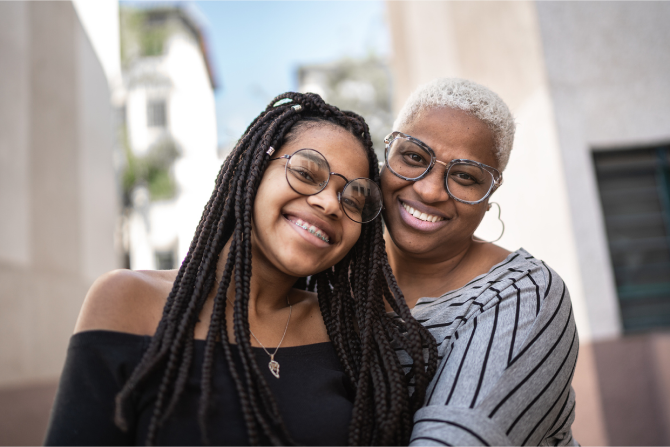 Mother and daughter embracing