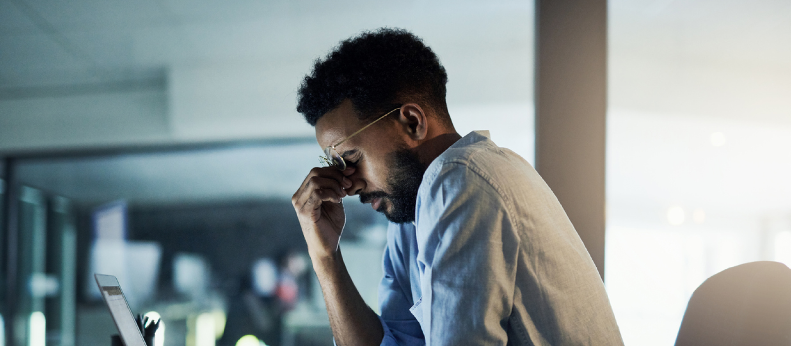 A young man sits at his computer with no motivation. He wants to take care of himself to help boost his motivation.