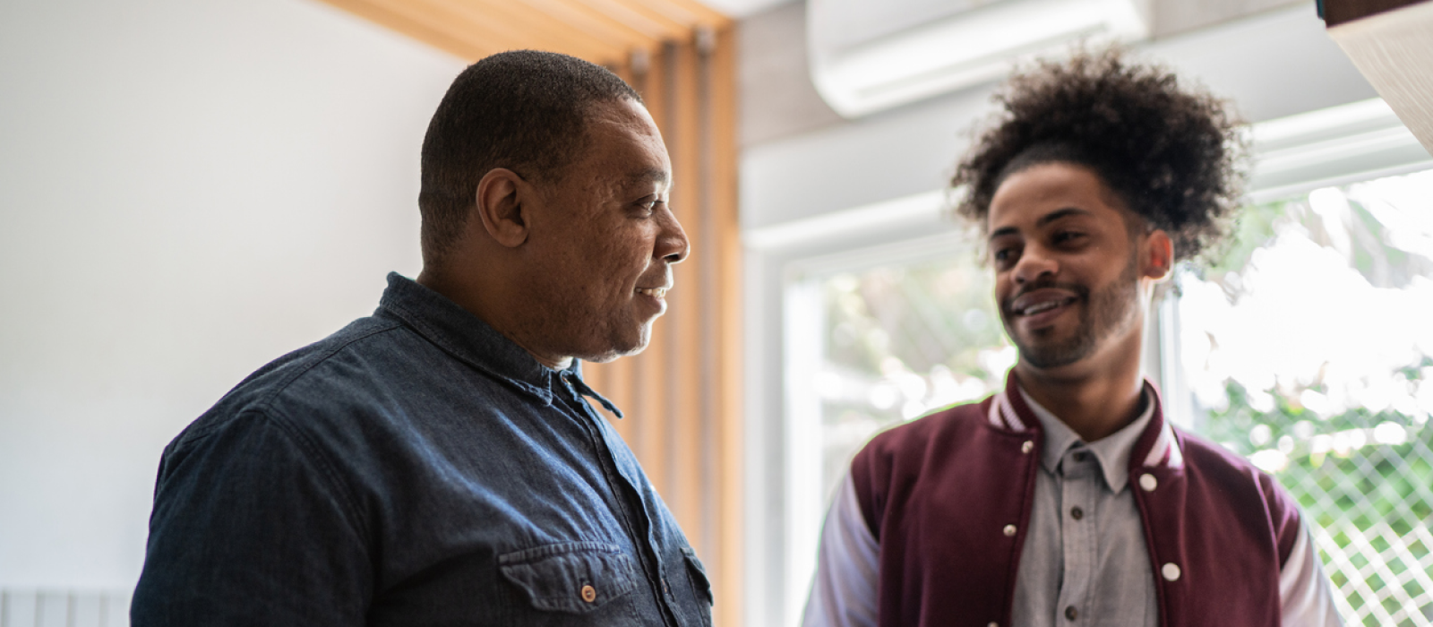 A young adult has set healthy boundaries with his parents by being assertive.