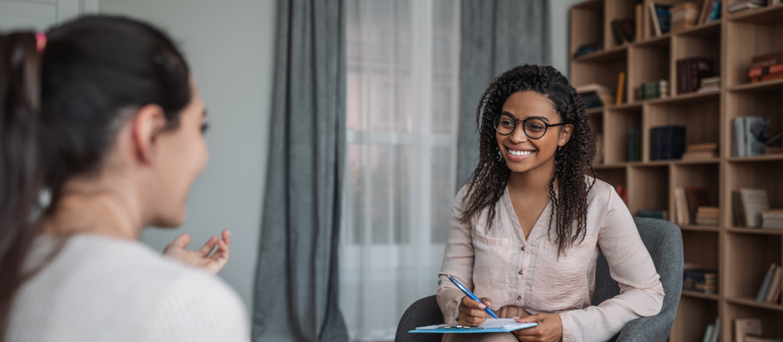 A young woman is in an EMDR session for treatment for treatment-resistance PTSD.