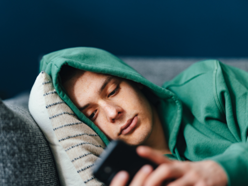 A young man is experiencing the effects of alcohol on depression.