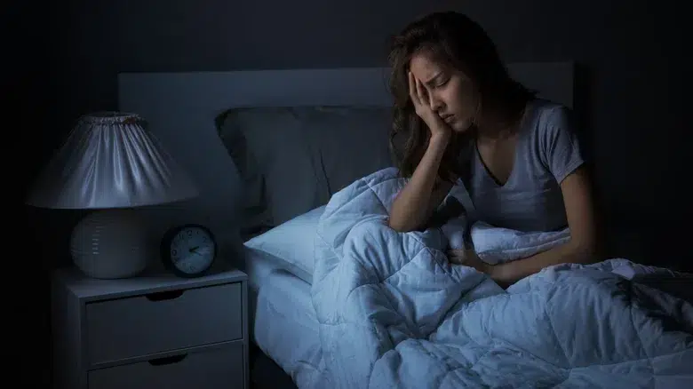Woman dealing with nighttime depression