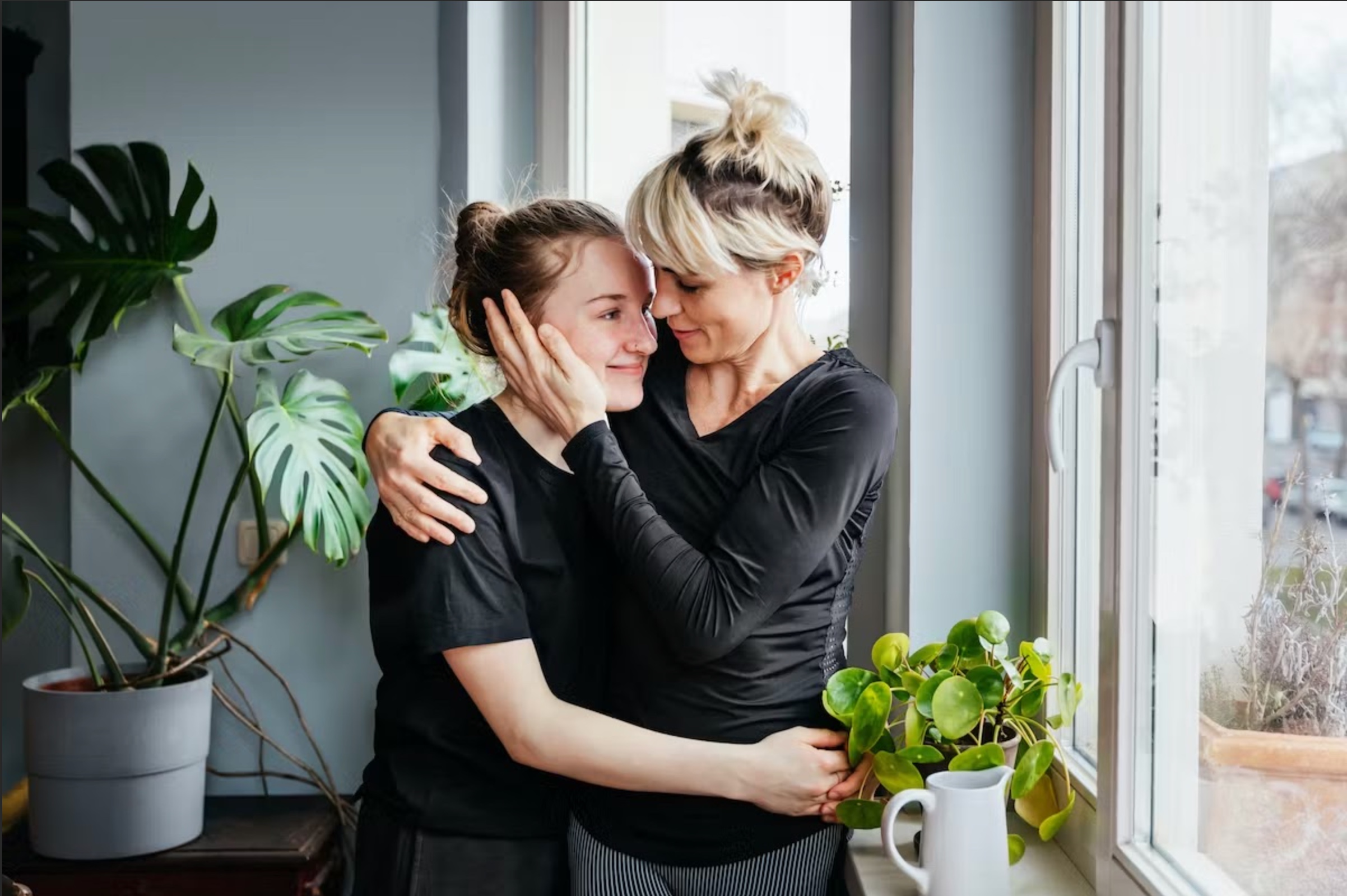 Teen and mother hugging