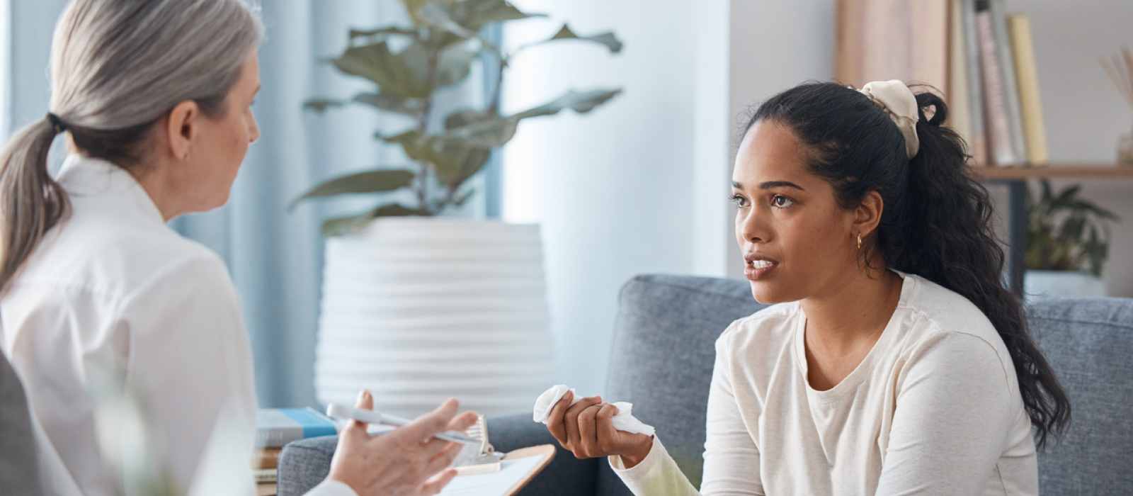 A young woman is in therapy for bipolar disorder.