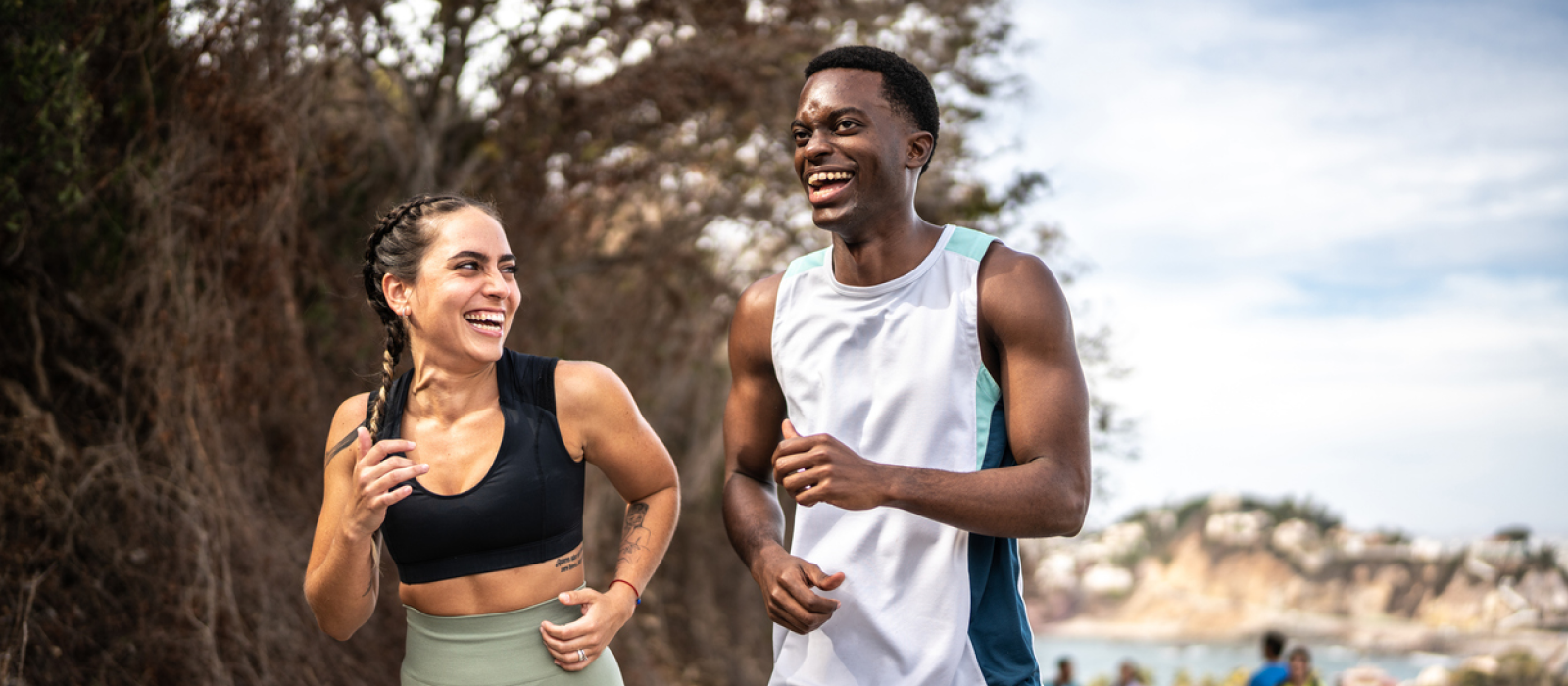 Two friends on a jog are using physical exercise to stimulate the vagus nerve.
