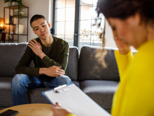 A teenage man is in therapy for suicidal thoughts.