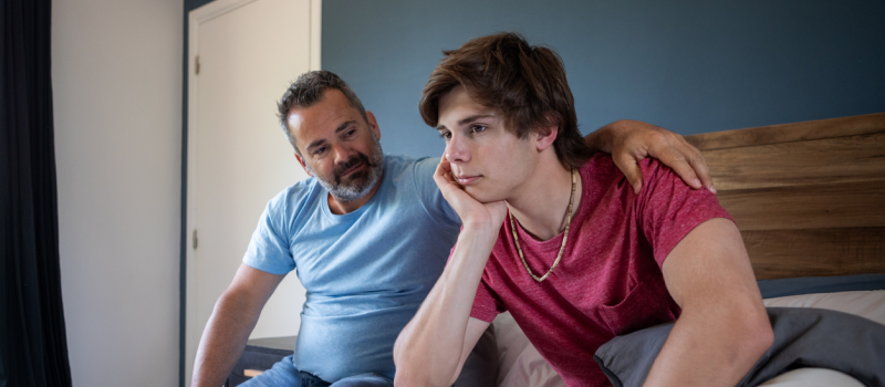 A father is learning helpful things to say to his son who has OCD.