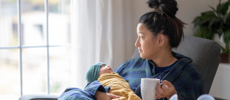 A young woman seeks professional support for postpartum anxiety.