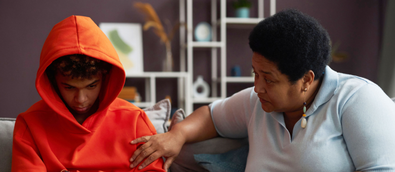 A young teen boy seeks support with his mother for ODD.