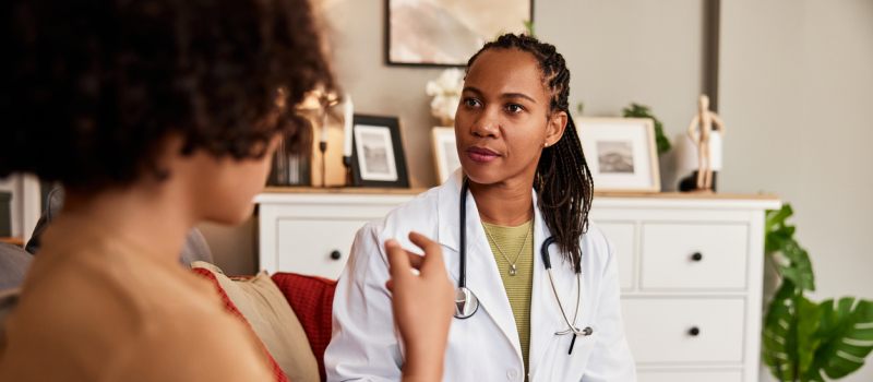 A young woman seeks advice from a psychiatrist on medication management.