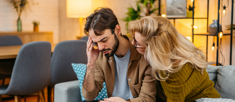 A young woman shows compassion and understanding to her partner she is dating.