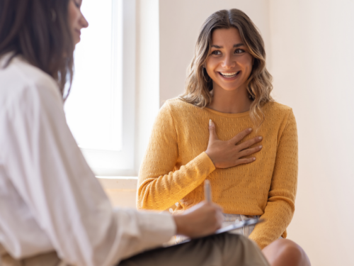 A young woman in therapy is learning how to heal from anxious attachment.
