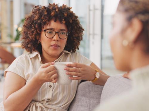 A young woman talks to her friend about the connection and differences between bipolar disorder and ADHD.