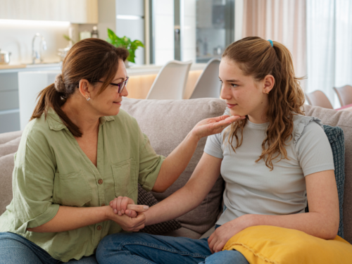 A mom comforts her daughter who is recovering from a nervous breakdown.