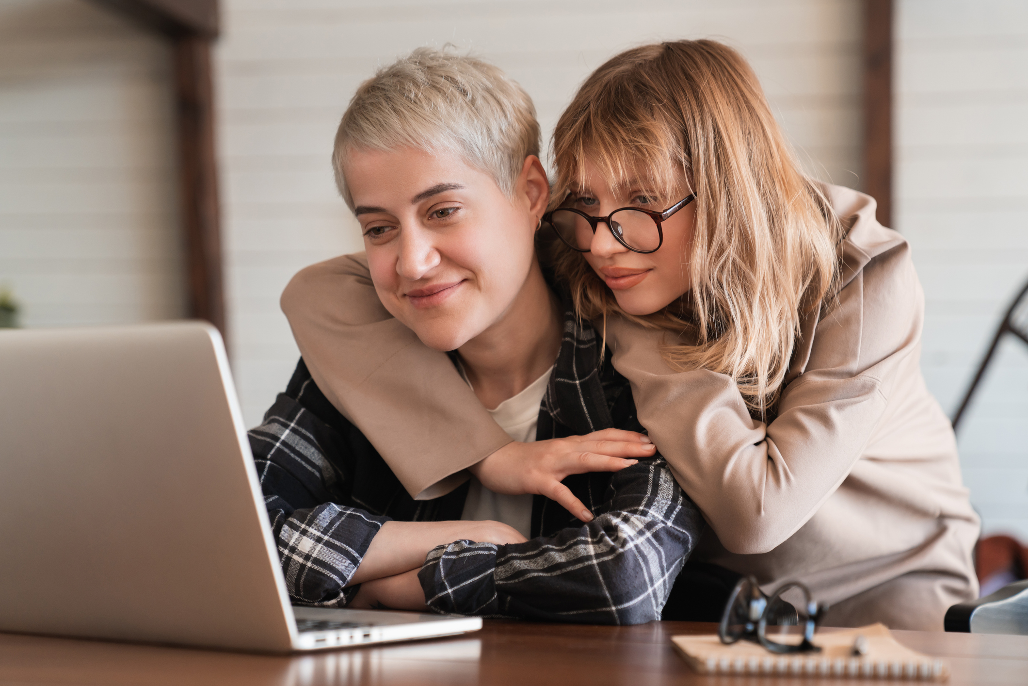 Couple hugging and embracing as they learn about their options for how to help improve their PTSD
