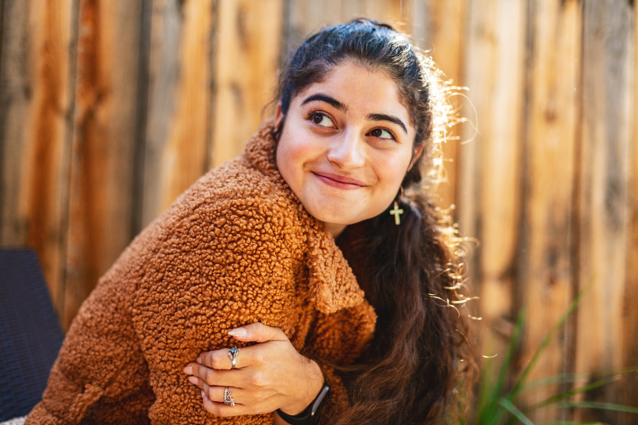 Young woman feeling light and happy in her interactions.