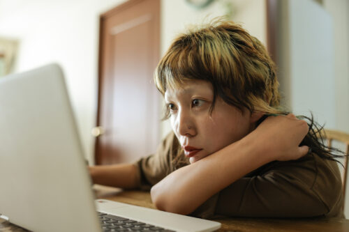Close up shot of young girl struggling to focus, showing signs of overthinking.